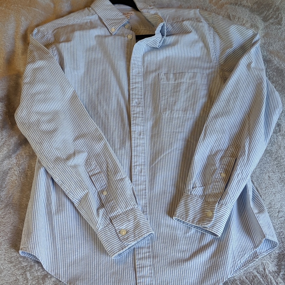 Blue and white striped button down shirt.